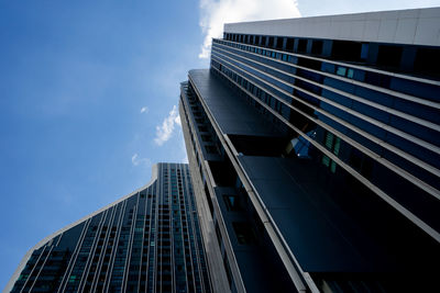 Low angle view of modern building against sky