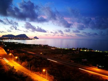 Scenic view of sea against sky at night