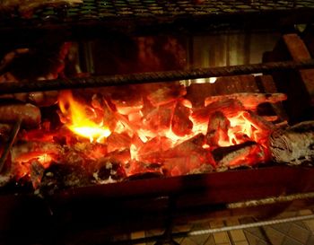 Close-up of firewood on barbecue grill