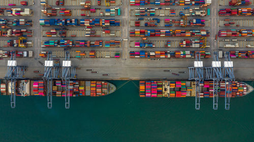 Aerial view container ship working at seaport, global business company import export logistic