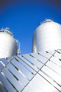 Low angle view of water tower against clear sky