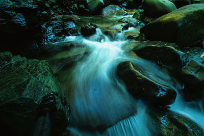 Close-up of water flowing through rocks