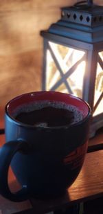 Close-up of coffee cup on table