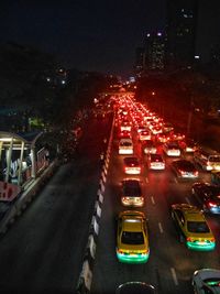 High angle view of traffic on city street at night