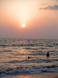 Scenic view of sea at sunset