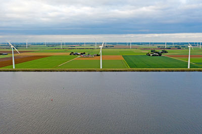 Scenic view of soccer field against sky