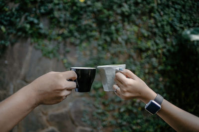 Close-up of woman hand holding drink