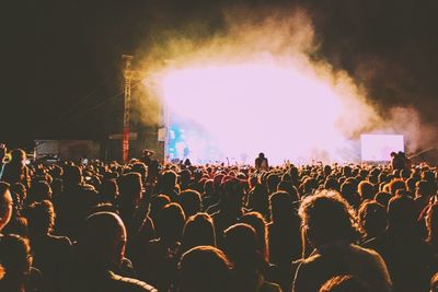 Crowd at music concert during night