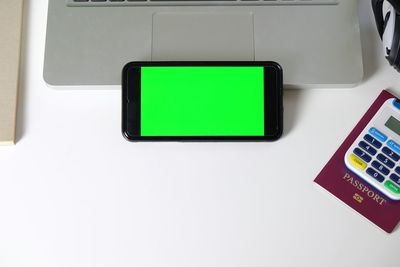 Close-up of mobile phone on table