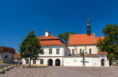 View of buildings against blue sky