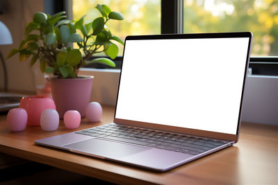 Close-up of laptop on table