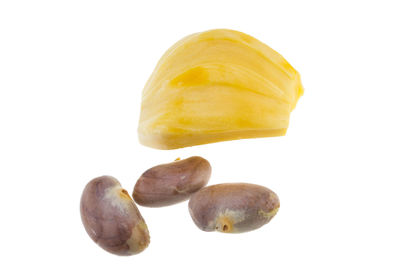 Close-up of bananas against white background