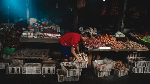 People at market stall