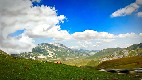 View of landscape against cloudy sky