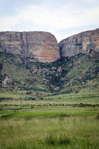 View of landscape against cloudy sky