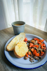 Close-up of breakfast served on table