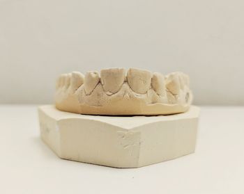 Close-up of dentures on table