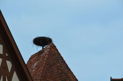 Low angle view of roof against clear sky