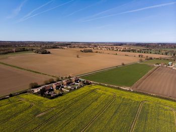 High angle view of agricultural colorful fields against sky in norfolk uk small village rural place