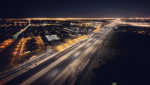 High angle view of light trails on road at night