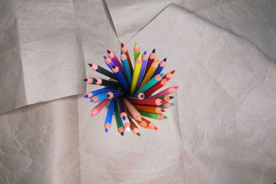 High angle view of multi colored pencils on table