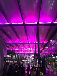 People walking in illuminated nightclub