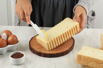 Midsection of man holding food