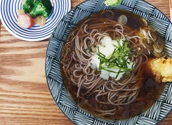 High angle view of soup in glass on table