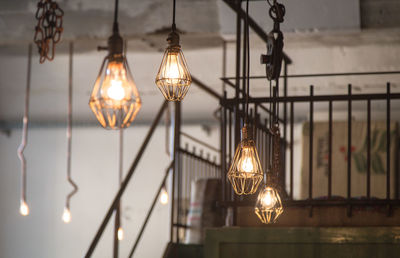 Illuminated light bulbs hanging