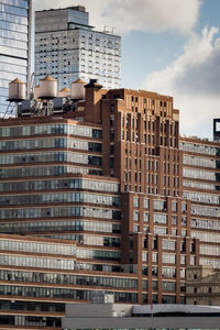 Low angle view of skyscraper against sky