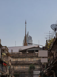 Low angle view of buildings against clear sky