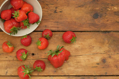 High angle view of strawberries on table