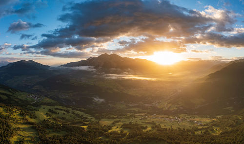 Scenic view of mountains against sky during sunset