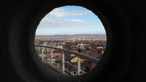 Cityscape seen through window