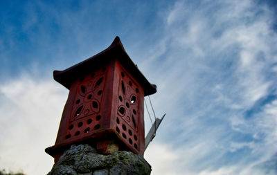 Low angle view of sculpture against sky