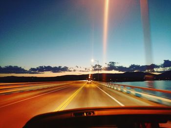 Highway seen through car windshield