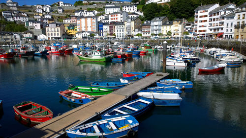 High angle view of boats moored in water