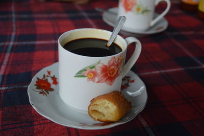 Lao coffee with khanom khuu or laotian fried donut