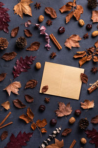 Autumn fall thanksgiving day composition with decorative dried leaves. flat lay, view from above