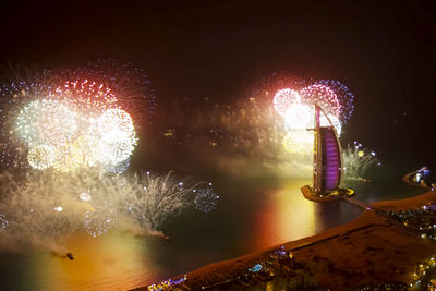 Firework display at night