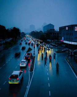 High angle view of vehicles on road in city