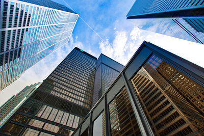 Low angle view of modern buildings against sky