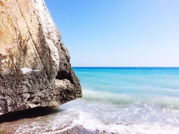 Scenic view of sea against clear blue sky