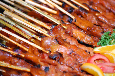 Close-up of meat on barbecue grill