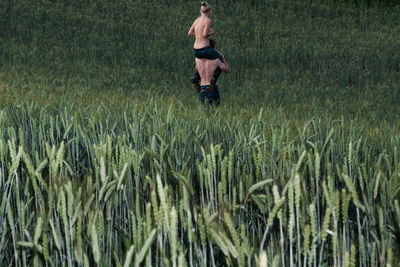 Full length of man standing in farm
