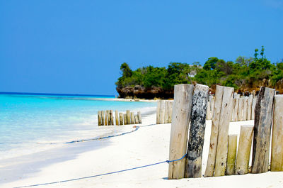 Scenic view of sea against clear blue sky