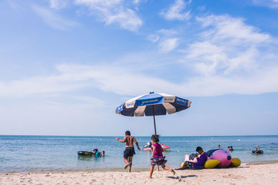 Scenic view of beach against sky