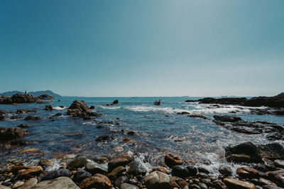 Scenic view of sea against clear sky