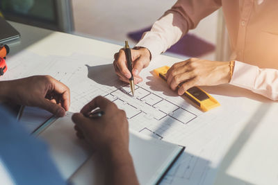 Businessmen working at desk in office