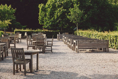 Empty tables bench in park